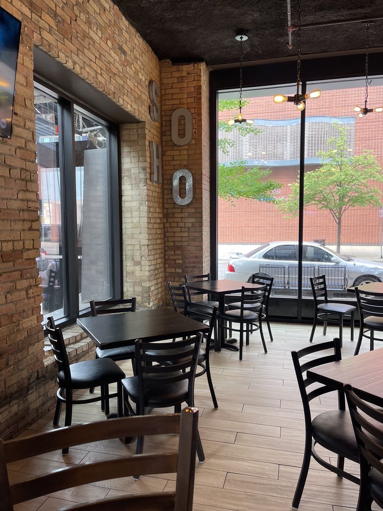 GR window seating with SOHO letters on brick wall